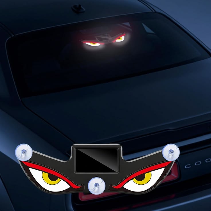 Devil Eyes LED car window decoration light displayed on a vehicle windshield