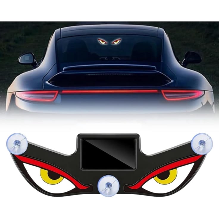 Animated Devil Eyes car window light installed on rear windshield at night